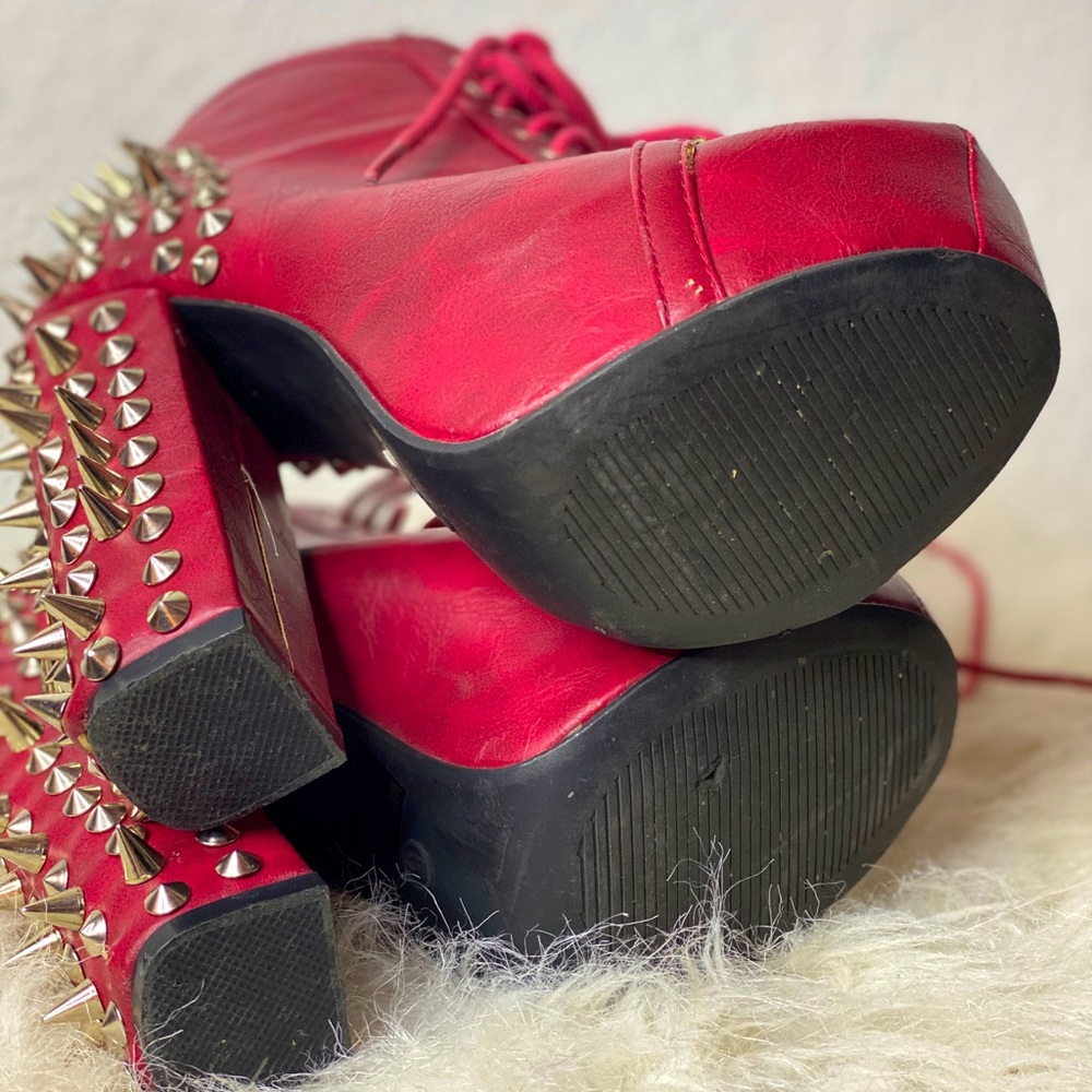Red studded ankle boots